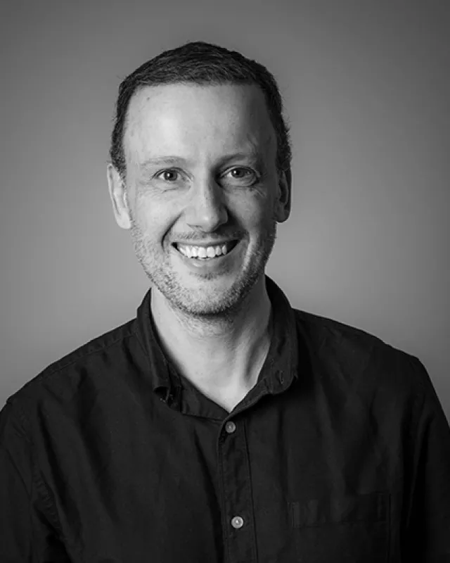 A headshot image of the Open Box staff member.